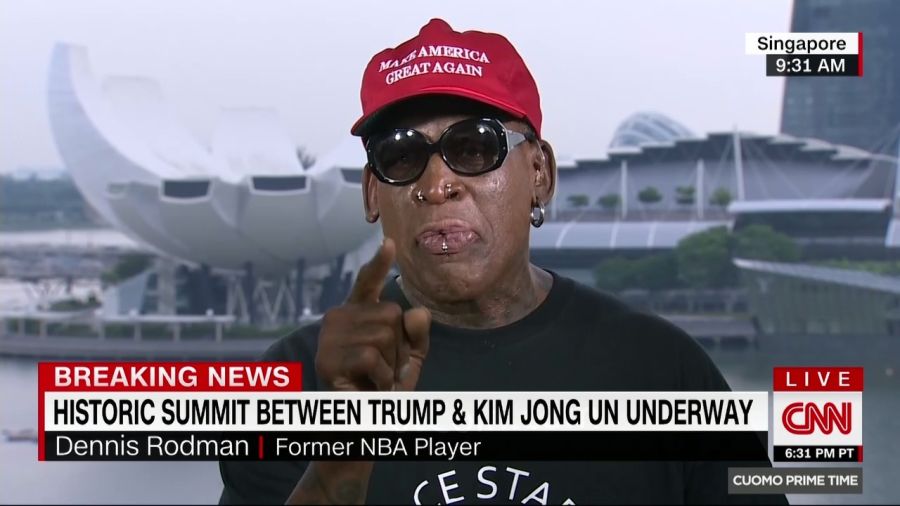 Dennis Rodman, cựu vận động viên bóng rổ Mỹ, đang trả lời phỏng vấn trực tiếp trên kênh CNN về Hội nghị Thượng đỉnh Mỹ-Triều. Ông đã tỏ ra rất xúc động và khóc khi nói về sự kiện. Ông cho biết thư ký của Tổng thống Trump đã gọi điện cho ông trước hội nghị, nói rằng Tổng thống rất tự hào về ông. Ông Rodman đã bay tới Singapore ngày 11/6. Ông có mối quan hệ bạn bè với ông Kim Jong-un – người rất yêu thích môn bóng rổ.