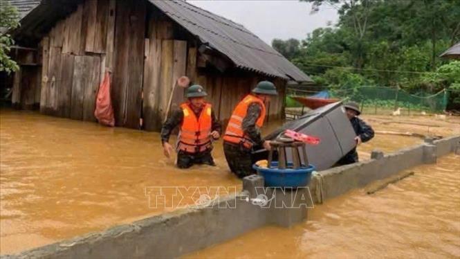 Bộ Y tế hướng dẫn người dân vùng lũ lụt phòng dịch bệnh Chú thích ảnh