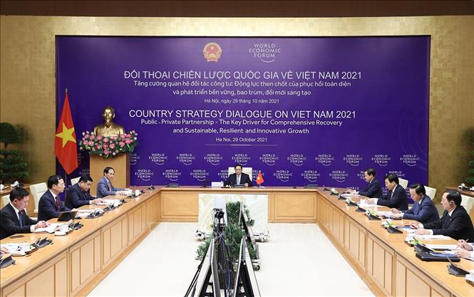 Thủ tướng Phạm Minh Chính chủ trì Đối thoại chiến lược quốc gia giữa Việt Nam và WEF tại điểm cầu Hà Nội. Ảnh: Dương Giang/TTXVN
