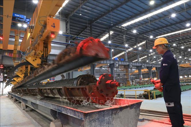 Khuyến khích doanh nghiệp nhà nước liên kết với FDI Chú thích ảnh