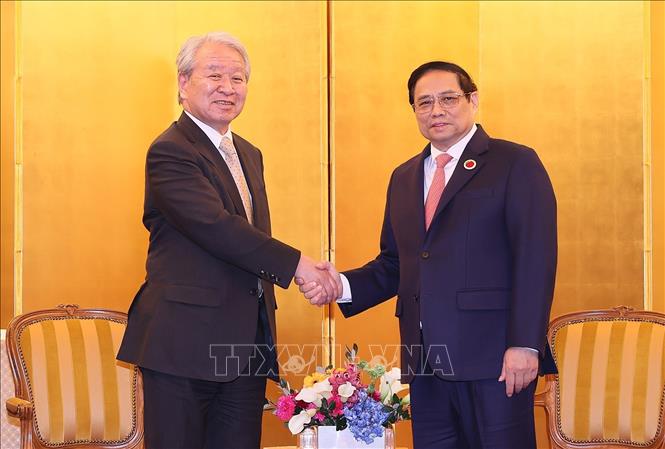 Thủ tướng Phạm Minh Chính tiếp Chủ tịch Cơ quan Hợp tác Quốc tế Nhật Bản Tanaka Akihiko. Ảnh: Dương Giang/TTXVN