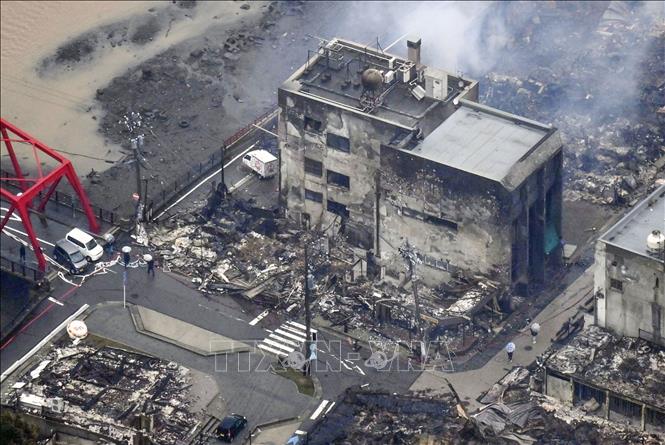日本の地震：悪天候が救援活動を妨げる
